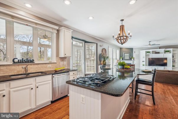 Chandelier, Dining room, Interior, Kitchen, Living room, Recessed Lighting, Wood Texture Flooring