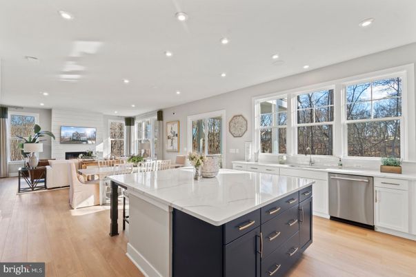 Dining room, Interior, Kitchen, Living room, Recessed Lighting, Stainless Steel Appliances, Wood Texture Flooring