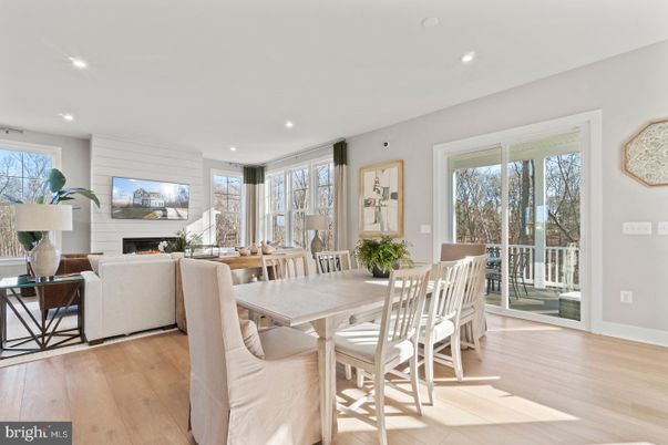 Dining room, Fireplace, Interior, Living room, Recessed Lighting, Wood Texture Flooring