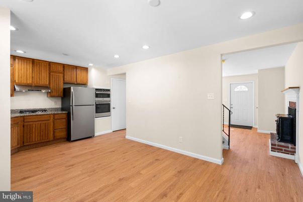 Fireplace, Interior, Kitchen, Recessed Lighting, Wood Texture Flooring