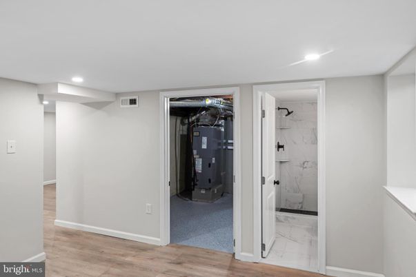 Interior, Marble, Marble Walls, Recessed Lighting, Wood Texture Flooring
