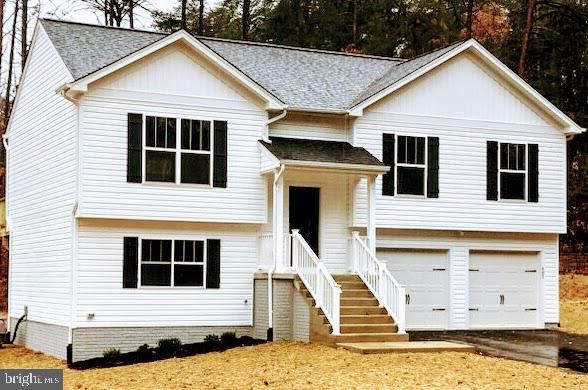 Attached, Exterior, Facade, Raised Ranch