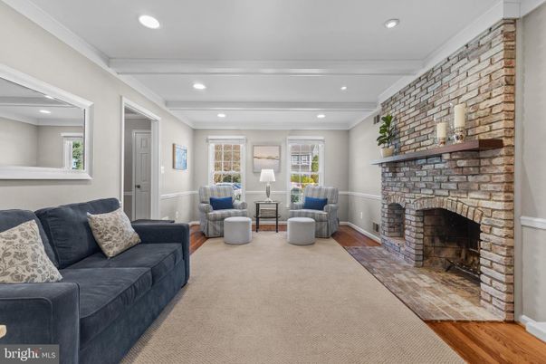 Fireplace, Interior, Living room, Recessed Lighting, Stone Walls, Wood Texture Flooring