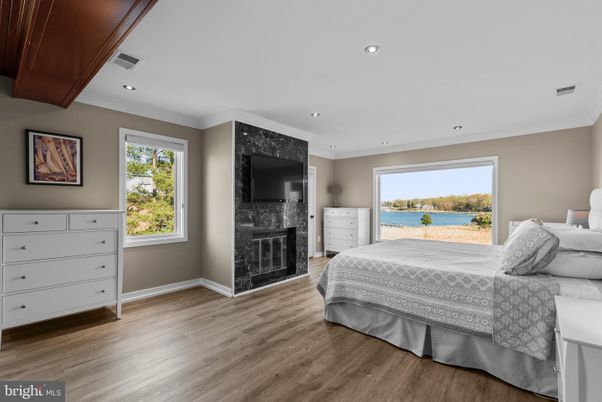 Bedroom, Fireplace, Interior, Recessed Lighting, Wood Texture Flooring
