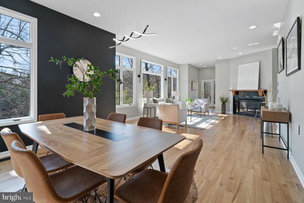 Dining room, Interior, Living room, Pendant Lights, Piano, Recessed Lighting, Wood Texture Flooring
