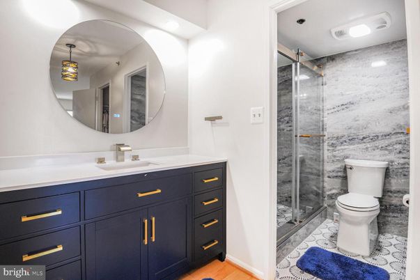 Bathroom, Dual Sink Vanities, Glass Shower, Interior, Marble, Recessed Lighting