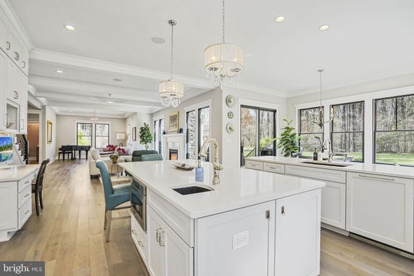 Chandelier, Dining room, Fireplace, Interior, Kitchen, Living room, Pendant Lights, Recessed Lighting, Wood Texture Flooring
