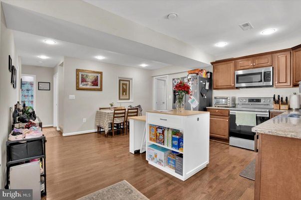 Dining room, Interior, Kitchen, Recessed Lighting, Stainless Steel Appliances, Wood Texture Flooring