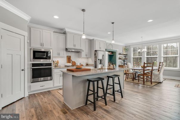 Dining room, Interior, Kitchen, Pendant Lights, Recessed Lighting, Stainless Steel Appliances, Wood Texture Flooring