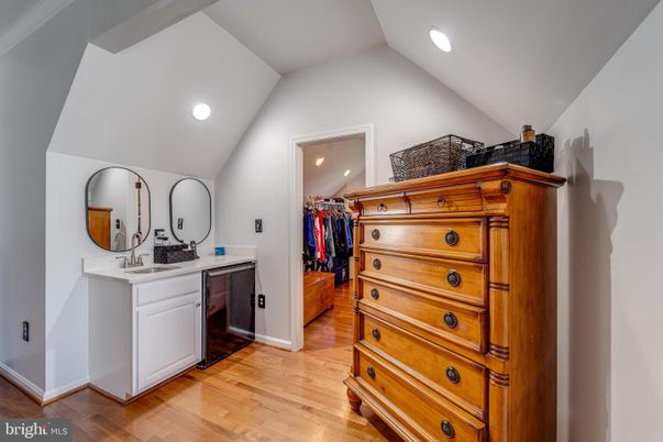 Bathroom, Dual Sink Vanities, Interior, Recessed Lighting, Walk-in Closets, Wood Texture Flooring