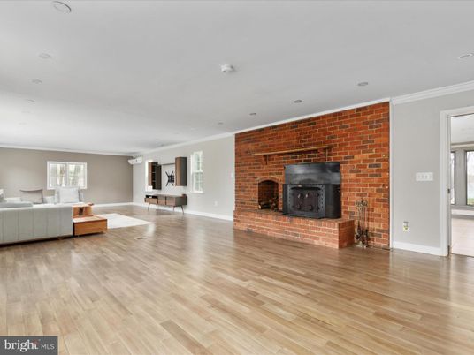 Empty room, Fireplace, Interior, Living room, Recessed Lighting, Stone Walls, Wood Texture Flooring