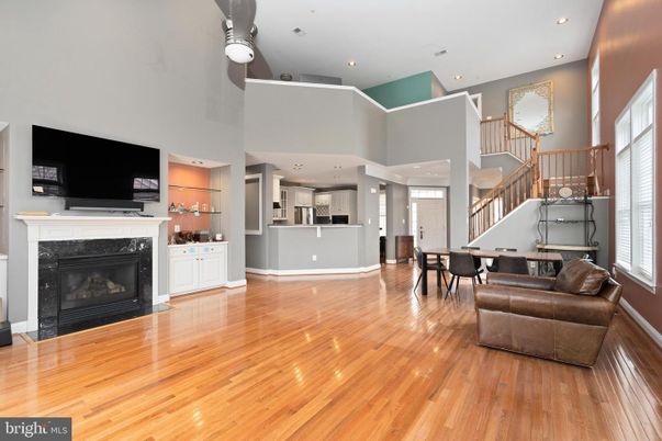 Dining room, Fireplace, Interior, Kitchen, Recessed Lighting, Wood Texture Flooring