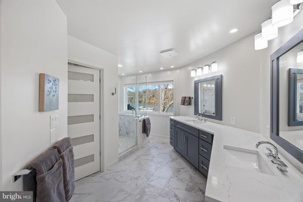 Bathroom, Dual Sink Vanities, Glass Shower, Interior, Marble, Recessed Lighting