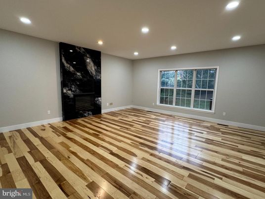 Empty room, Fireplace, Interior, Recessed Lighting, Wood Texture Flooring