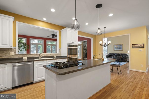 Chandelier, Interior, Kitchen, Pendant Lights, Recessed Lighting, Stainless Steel Appliances, Wood Texture Flooring