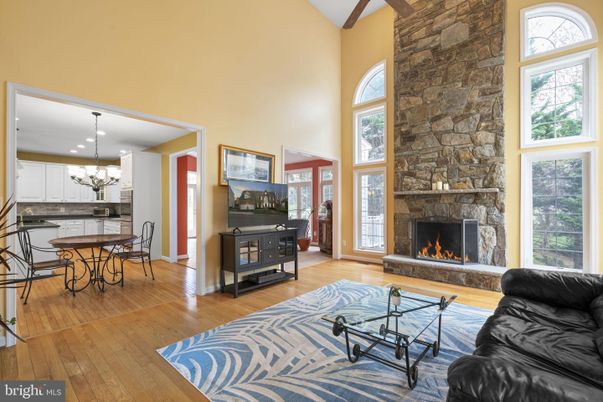 Chandelier, Dining room, Fireplace, Interior, Kitchen, Living room, Pendant Lights, Recessed Lighting, Stone Walls, Wood Texture Flooring