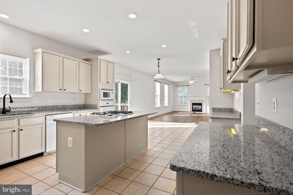 Fireplace, Interior, Kitchen, Pendant Lights, Recessed Lighting, Wood Texture Flooring