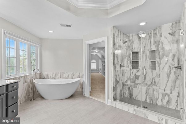 Bathroom, Free Standing Baths, Glass Shower, Interior, Marble Walls, Recessed Lighting