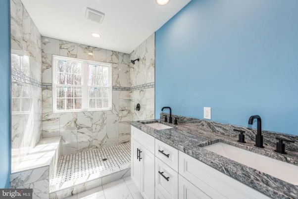 Bathroom, Dual Sink Vanities, Interior, Marble, Marble Walls, Recessed Lighting