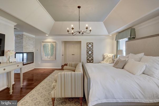 Bedroom, Chandelier, Interior, Recessed Lighting, Stone Walls, Wood Texture Flooring