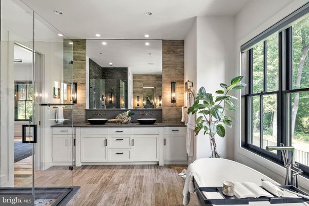 Bathroom, Dual Sink Vanities, Free Standing Baths, Glass Shower, Interior, Recessed Lighting, Wood Texture Flooring