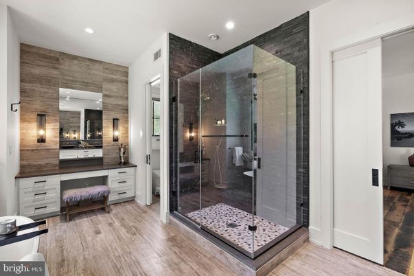 Bathroom, Glass Shower, Interior, Recessed Lighting, Wood Texture Flooring, Wooden Walls
