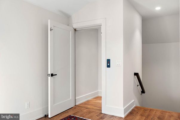 Elevator, Interior, Recessed Lighting, Wood Texture Flooring