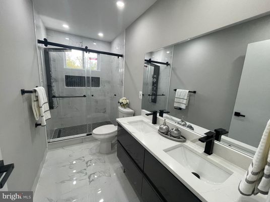 Bathroom, Dual Sink Vanities, Glass Shower, Interior, Marble, Recessed Lighting