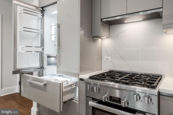 Interior, Kitchen, Marble Walls, Stainless Steel Appliances, Wood Texture Flooring