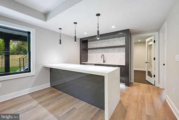 Interior, Kitchen, Marble Walls, Pendant Lights, Recessed Lighting, Wood Texture Flooring
