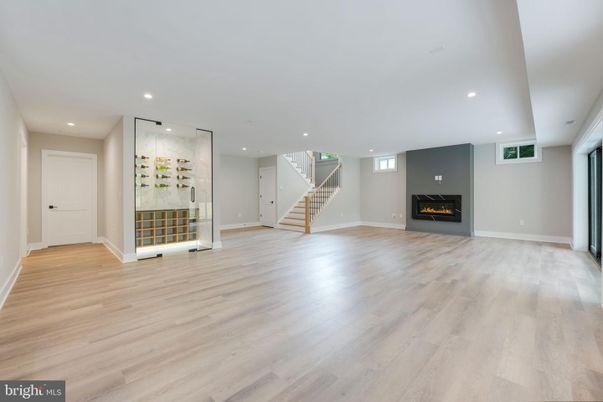 Empty room, Fireplace, Interior, Recessed Lighting, Wine Storage, Wood Texture Flooring