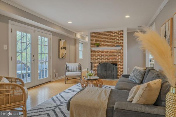 Fireplace, Interior, Living room, Recessed Lighting, Stone Walls, Wood Texture Flooring