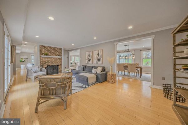 Dining room, Fireplace, Interior, Living room, Pendant Lights, Recessed Lighting, Stone Walls, Wood Texture Flooring