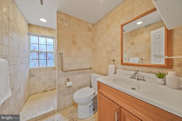 Bathroom, Glass Shower, Interior, Recessed Lighting, Stone Walls