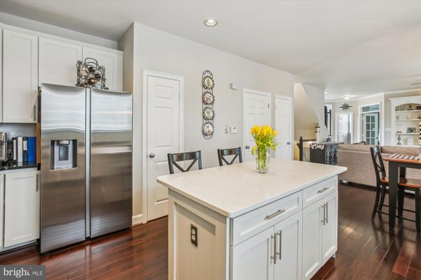 Dining room, Interior, Kitchen, Recessed Lighting, Stainless Steel Appliances, Wood Texture Flooring