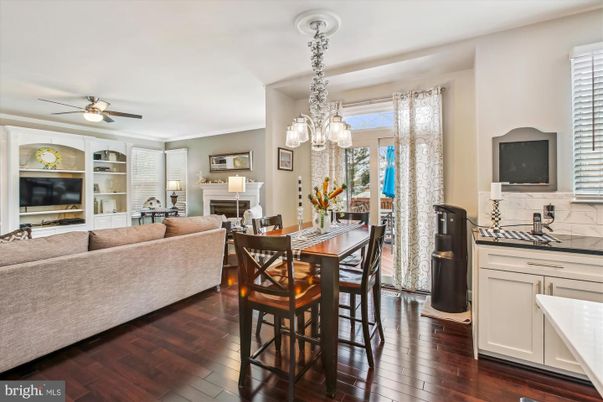 Chandelier, Dining room, Fireplace, Interior, Living room, Pendant Lights, Wood Texture Flooring