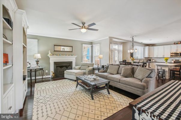 Chandelier, Dining room, Fireplace, Interior, Kitchen, Living room, Pendant Lights, Recessed Lighting, Wood Texture Flooring