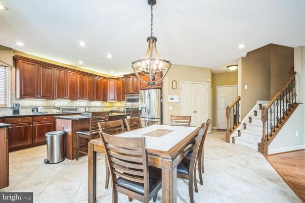 Chandelier, Dining room, Interior, Kitchen, Pendant Lights, Recessed Lighting, Stainless Steel Appliances
