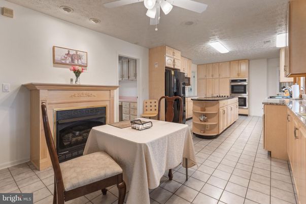Dining room, Fireplace, Interior, Kitchen, Recessed Lighting, Stainless Steel Appliances
