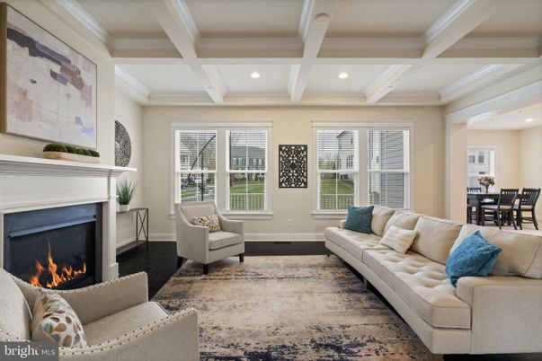 Dining room, Fireplace, Interior, Living room, Recessed Lighting, Wood Texture Flooring