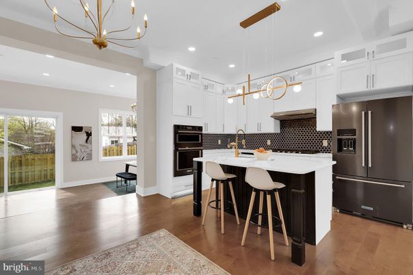 Chandelier, Interior, Kitchen, Pendant Lights, Recessed Lighting, Stainless Steel Appliances, Wood Texture Flooring