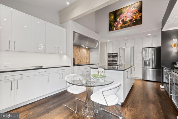 Dining room, Interior, Kitchen, Recessed Lighting, Stainless Steel Appliances, Wood Texture Flooring