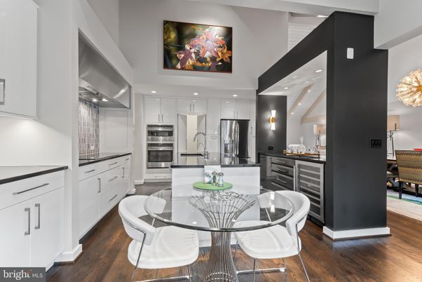 Dining room, Interior, Kitchen, Recessed Lighting, Stainless Steel Appliances, Wood Texture Flooring