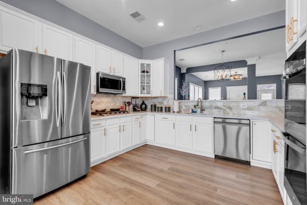 Chandelier, Interior, Kitchen, Recessed Lighting, Stainless Steel Appliances, Wood Texture Flooring