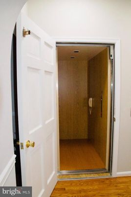 Elevator, Interior, Wood Texture Flooring