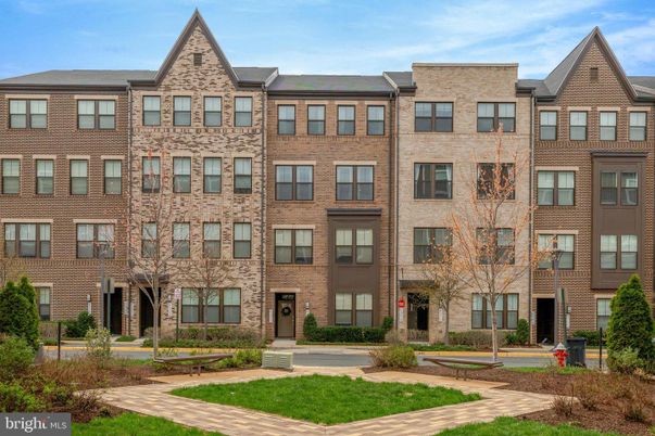 Exterior, Facade, Brick Facade, Condo Building