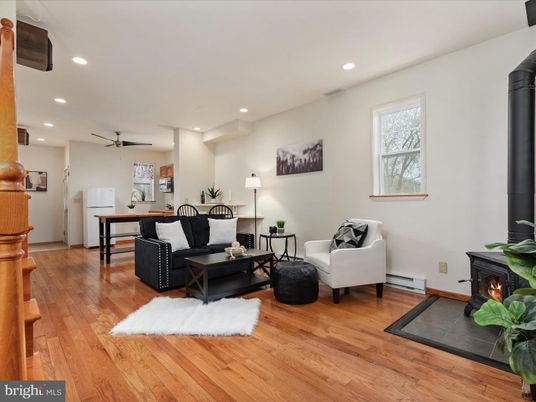Dining room, Fireplace, Interior, Living room, Recessed Lighting, Wood Texture Flooring