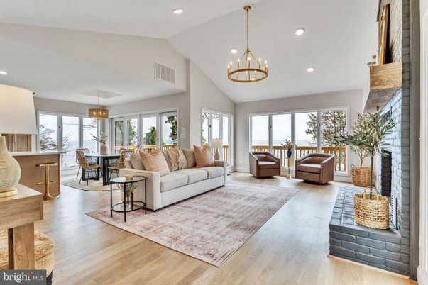 Dining room, Fireplace, Interior, Living room, Pendant Lights, Recessed Lighting, Wood Texture Flooring