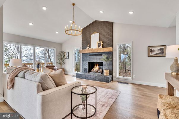 Fireplace, Interior, Living room, Pendant Lights, Recessed Lighting, Stone Walls, Wood Texture Flooring