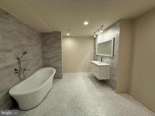 Bathroom, Free Standing Baths, Interior, Marble Walls, Recessed Lighting